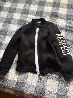 Moncler Black Jacket with White Trim and 'RESPECT' Sleeve